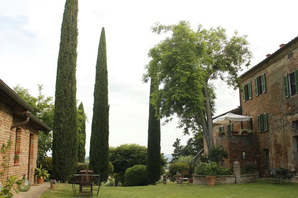 Est-il possible de louer une villa en Toscane pour des vacances axées sur la cuisine et les visites de fermes locales?
